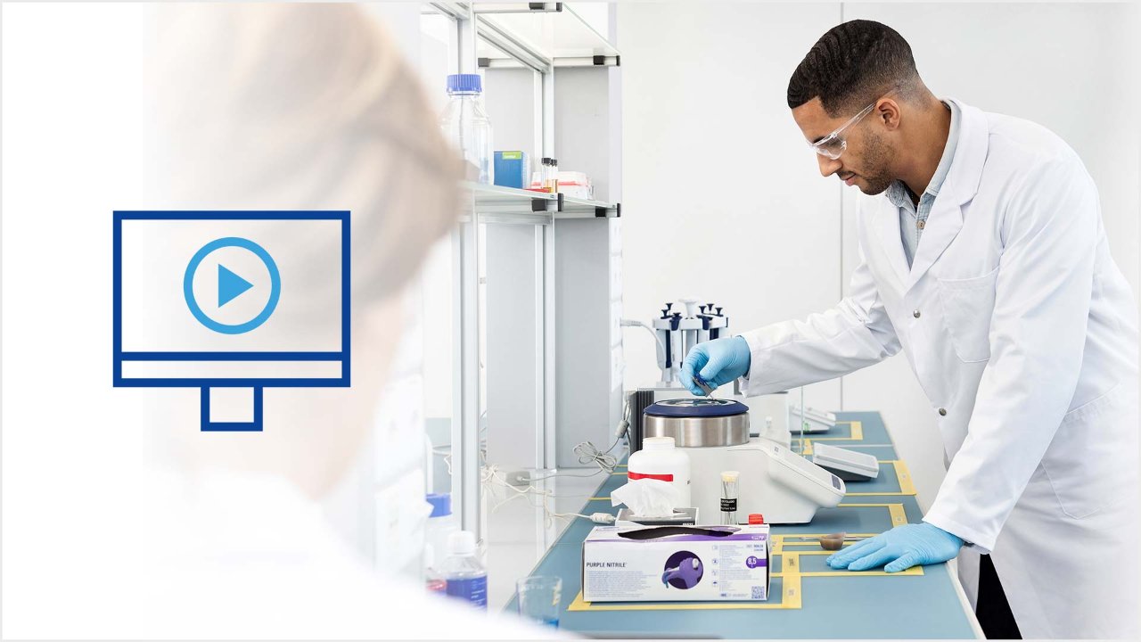 man working at a lab bench with a lean lab set up