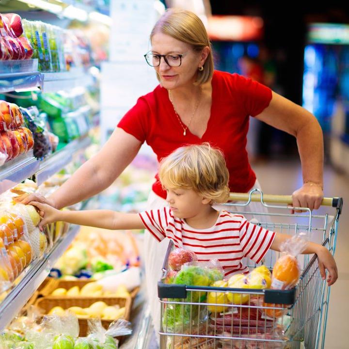 Mother and child at food store Mother and child at food store